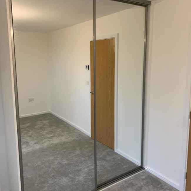 Fitted wardrobes by NC Joinery Greater Manchester